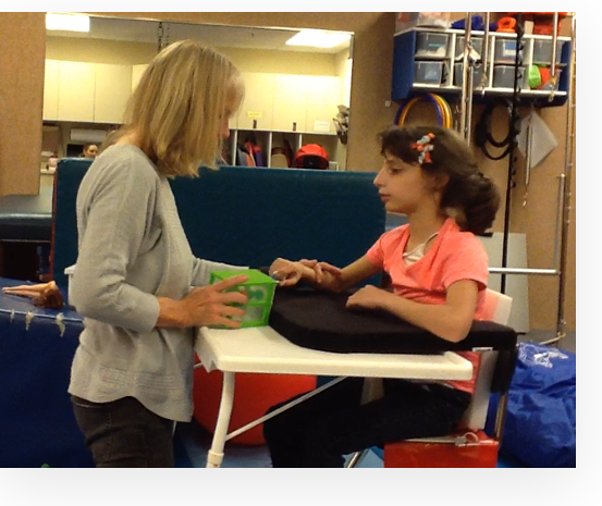 Linda teaching a student