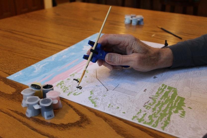 Elderly painting with functionalhand